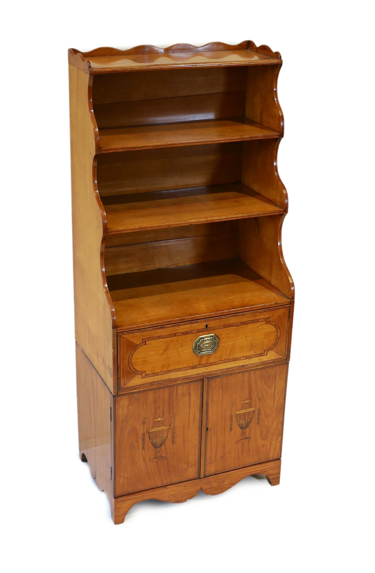 A George III Sheraton style inlaid satinwood waterfall bookcase, W.56cm D.37cm H.135cm